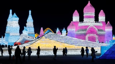 By night, the ice park transforms with colourful lights. Reuters