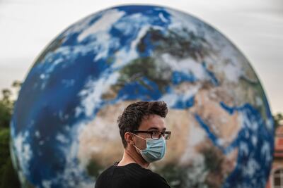 A giant inflatable model of the Earth during European Sustainable Development Week, as well on World Clean Up day, at the garden of Czech Ministry of Foreign Affairs in Prague, Czech Republic, September 19. Martin Divisek / EPA