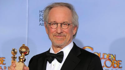 Director Steven Spielberg poses backstage with the award for Best Animated Feature Film for "The Adventures of Tintin". AP Photo/Mark J. Terrill