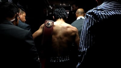Manny Pacquiao exits the arena after his unanimous-decision victory over Jessie Vargas. Christian Petersen / Getty Images
