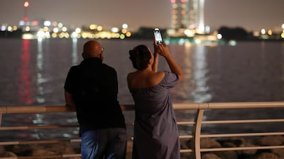 Skygazers came out to watch the celestial event. Pawan Singh/ The National