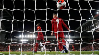 Liverpool's Sadio Mane celebrates scoring their third goal with Roberto Firmino. Reuters