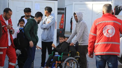 Palestinians in need of medical treatment outside Gaza, accompanied by relatives, wait to leave through the Rafah border crossing into Egypt on Wednesday. AFP