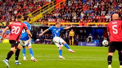Italy's Nicolo Barella scores their second goal. PA