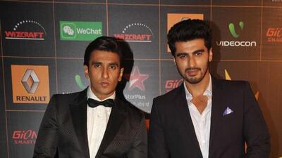 Expect plenty of laughs when Ranveer Singh, left, and Arjun Kapoor take the stage on Sunday, June 7 to host the 16th edition of the IIFA awards in Kuala Lumpur. AFP PHOTO / STR