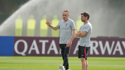 South Korea's head coach Paulo Bento, left, talks with assistant coach Sergio Costa. AP