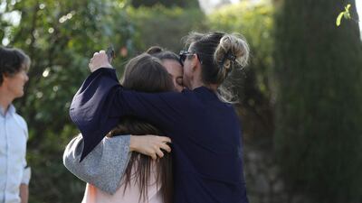 People react near the Tocqueville high school in the southern French town of Grasse following a shooting by a pupil on March 16, 2017. Valery Hache / AFP