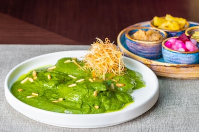 Palak murgh, a spinach curry dish at Kinara by Vikas Khanna