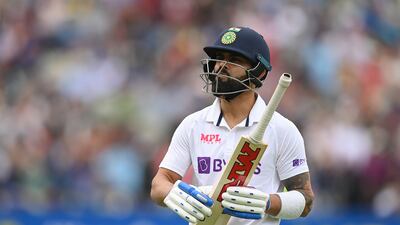 India's Virat Kohli of India walks off after being dismissed for 20. Getty