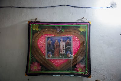 A wedding photo frame of Shivanand Chaurasia, an Indian seafarer aboard the Palau-flagged tanker MT Settebello, who was among three crew members killed in one of the US attacks on Indian-crewed tankers this week. REUTERS