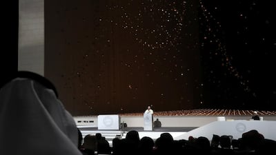 Pope Francis on stage. Reuters