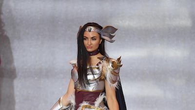 Miss Iceland Kolfinna Mist Austfjord performs during the final in the ExCel centre in London. EPA