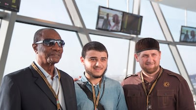 Alpha Conde, president of Guinea (L), and Ramzan Kadyrov, president of Chechnya, attend the final race of the 2013 Formula One season at the Abu Dhabi Grand Prix in Yas Marina Circuit. Mohmamed Al Hammadi / Crown Prince Court - Abu Dhabi