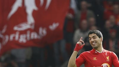 Liverpool's Luis Suarez was smiling against Tottenham Hotspur at Anfield. Reuters / March 30 2014