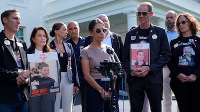Families of hostages being held in Gaza speak outside the White House on July 22. AP