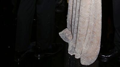 Prince William greets singer Ellie Goulding after the Royal Variety Performance at The London Palladium on November 13, 2014. AFP