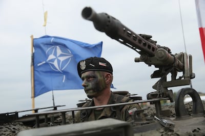 A soldier takes part in Nato military exercises in Poland. Getty Images