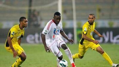 Ibrahim Diaky, centre, has left Al Jazira after nine years to join Pro League champions Al Ain. Jake Badger for The National
