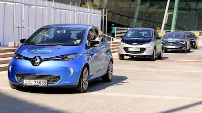 Cars leave the EVRT Middle East launch at the World Future Energy Summit at Adnec in Abu Dhabi. Victor Besa / The National