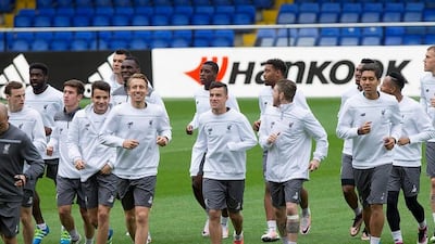 Liverpool players warm up during a training session held at El Madrigal stadium in Villarreal, eastern Spain, 27 April 2016. Liverpool FC will face Villarreal CF in the UEFA Europa League semi final, first leg soccer match on 28 April 2016. EPA/DOMENECH CASTELLO