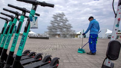 A municipality worker busy near the new sculpture. Victor Besa / The National