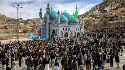 Afghans gather around the shrine of St Sakhi Saib for Nowruz. EPA