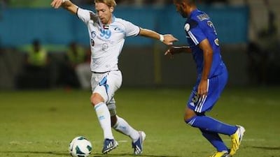 Christian Wilhelmsson of Baniyas, left, has missed pre-season training on last two occasions. Jake Badger for The National
