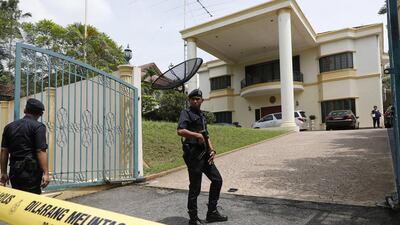 Police put a cordon in front of the North Korean embassy in Kuala Lumpur, Malaysia, on Tuesday, March 7, 2017. Malaysia said North Korean embassy staff were barred from leaving its country. Malaysia expelled the North Korean ambassador on Monday. Vincent Thian / AP Photo