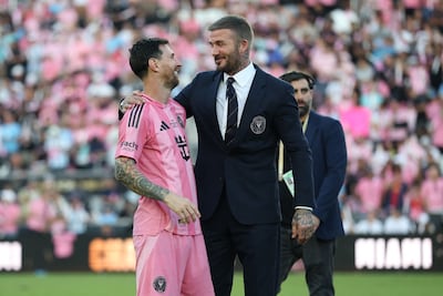 Inter Miami co-owner David Beckham celebrates with Lionel Messi after the win over Vancouver Whitecaps. AFP