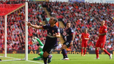 Santi Cazorla of Arsenal celebrates after scoring the second goal against Liverpool at Anfield. Alex Livesey/Getty Images