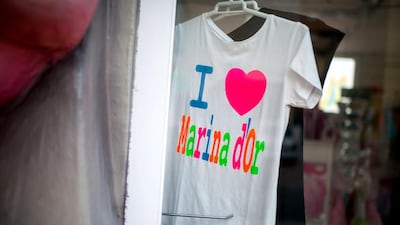 A t-shirt hangs at a souvenir store in the Marina d’Or resort. David Ramos / Getty Images