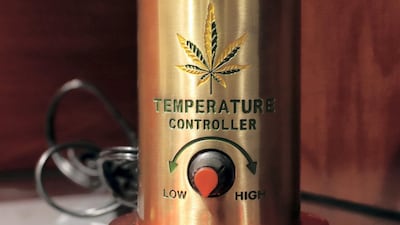 Cannabis smoking paraphernalia is seen at the exhibition of seizures at Dubai Airport.