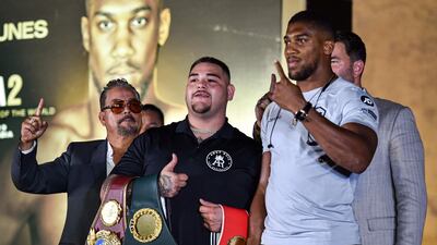 Andy Ruiz Jr and Anthony Joshua square off during the "Clash on the Dunes" press conference. AFP