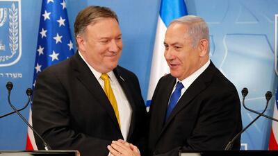 U.S. Secretary of State Mike Pompeo. left. is greeted by Israeli Prime Minister Benjamin Netanyahu ahead of a press conference at the Ministry of Defense in Tel Aviv, Sunday, April 29, 2018. Thomas Coex / AFP