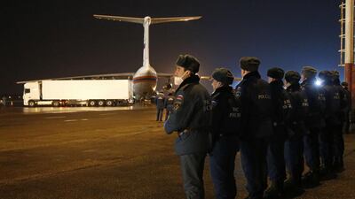 Emergency situations employees in Russia prepare to load the bodies of the victims from the ministry’s plane at the airport in Saint Petersburg. Metrojet plane crashed in the Sinai Peninsula, 23 minutes after taking off from Sharm el-Sheikh en route to Saint Petersburg, killing all 224 people on board. Dmiitry Lovetsky / AFP