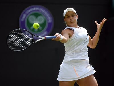 Ashleigh Barty began her bid for successive grand slam titles with a first-round WImbledon win over Saisai Zheng. EPA