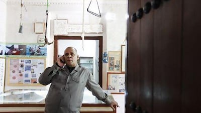 Fathy Mohammed Abdullah, an archaeologist and tour guide with Mishka Tourism, at the Dalma Museum. Sarah Dea / The National