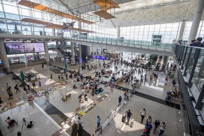 Demonstrators on the arrival hall floor at Hong Kong International Airport. Bloomberg