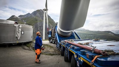 A wind turbine blade is transported on a special vehicle to Griessee lake. The wind turbines were developed by the company SwissWinds. Olivier Maire / EPA