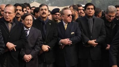 The Pakistani prime minister, Yusuf Raza Gilani (second left), Farooq Naek (left), chairman of Senate, former foreign minister Khurshid Kasuri (second right), minister of water and power Raja Pervez Arshraf and foreign minister Shah Mehmood Qureshi (right) attend the funeral of Salman Taseer, the murdered governor of Pakistan's most populous province, Punjab.