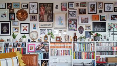 Paula Truscott is an avid thrift shopper, and displays her finds on a gallery wall and shelf in her home. Photo: Paula Truscott