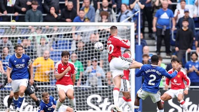 Ainsley Maitland-Niles curls home Everton’s second goal in stoppage time. Getty Images