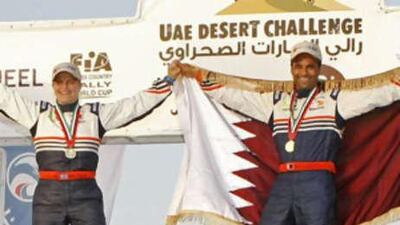 Qatar's Nasser al Attiyah, right, is the first Arab driver to win the UAE Desert Challenge in 15 years. The UAE's Yahya Alhelei, left, took second.