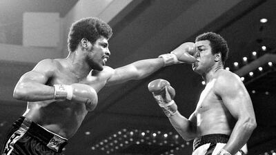 Leon Spinks punches heavyweight champion Muhammad Ali in the face during their title fight at Las Vegas on February 15, 1978. AP