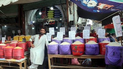A vendor waits for customers in Karachi. With 220 million people, a nuclear stockpile and a fragile democracy, there is likely to always be some sensitivity to what a default in Pakistan may cost the world. EPA