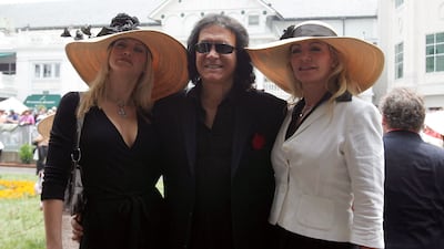 Actress Tracy Tweed, musician Gene Simmons and actress Shannon Tweed did not steal the queen's thunder in 2007. Getty Images / AFP