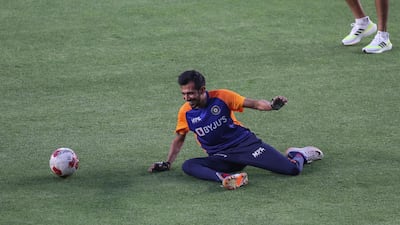 India's Yuzvendra Chahal takes a fall. PA