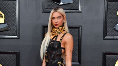 Dua Lipa in Versace at the 64th Annual Grammy Awards at the MGM Grand Garden Arena in Las Vegas on April 3, 2022. AFP