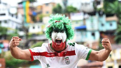 An Iran fan poses prior to kickoff during the Group F match between Iran and Bosnia on Wednesday at the 2014 World Cup in Salvador, Brazil. Laurence Griffiths / Getty Images