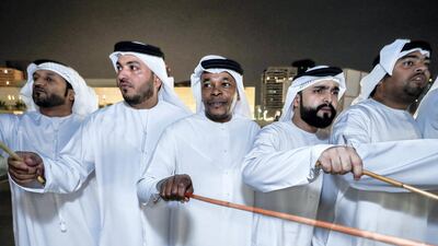 Ayala is a traditional Emirati dance performed with sticks at Qasr Al Hosn. Victor Besa / The National